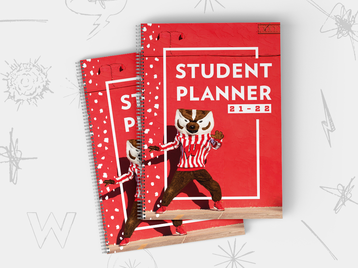 Photo of the cover of two student planners with Bucky