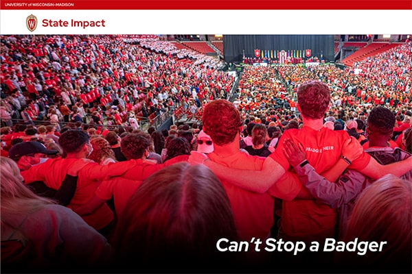 Homepage of the State Impact site which shows the crest and an image of thousands of UW students at an event along with the caption Can't Stop a Badger.