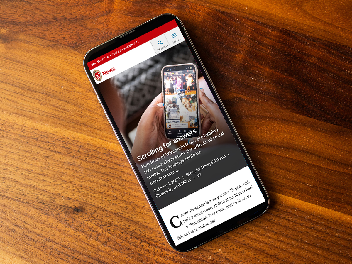 Mobile phone on a wooden background