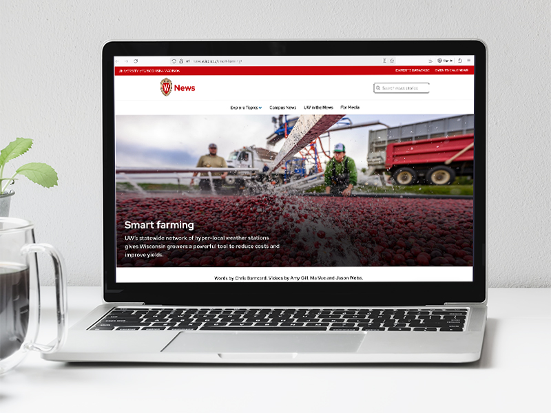 A laptop showing a news site with a feature story