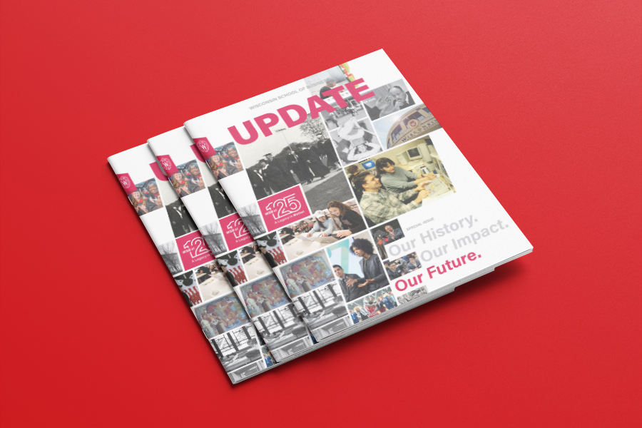 A stack of three Wisconsin School of Business's Update magazines