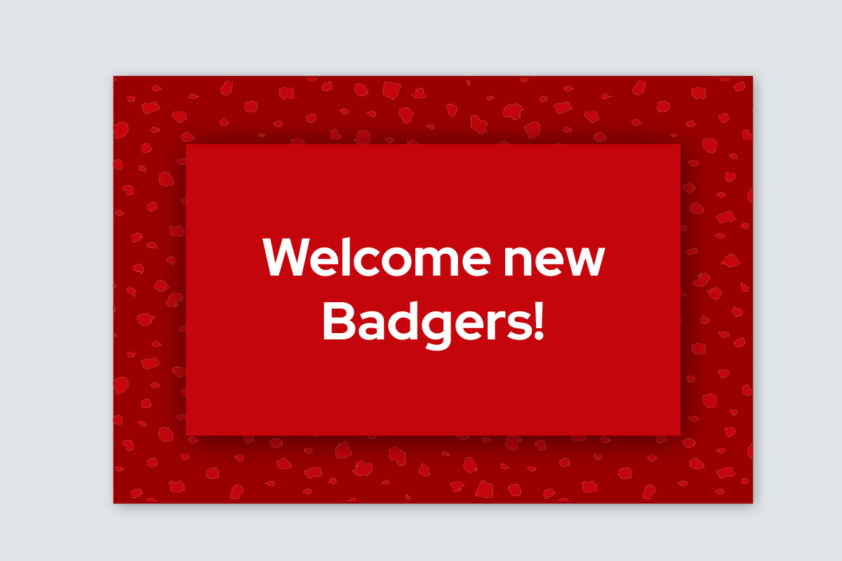 A red sign reading "Welcome new Badgers!"
